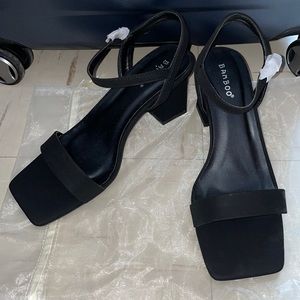 Brand new, black heals size 8.5